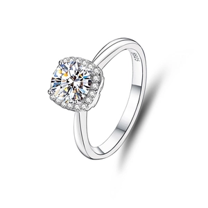 Macro shot of S925 sterling silver ring showing the square halo and round moissanite