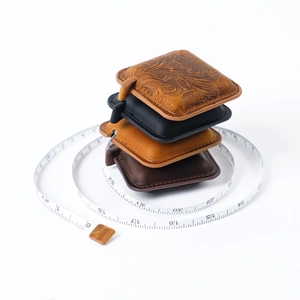 Handmade leather mini tape measure in four retro colors including embossed brown leather