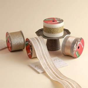 Champagne gold and beige decorative Christmas ribbons with metallic glitter for gift wrapping