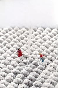 Macro detail of thick grey chenille bath mat showing superior water absorption texture