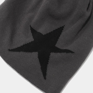 Dark grey knitted beanie featuring a black star pattern for winter warmth and outdoor style