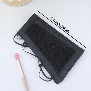 Black fabric makeup brush cleaning sleeve with velcro strap and elastic lanyard tool