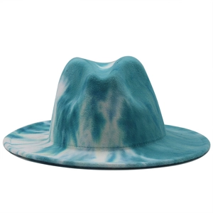 Close-up of wide-brim fedora hat featuring blue and white tie-dye wool felt pattern