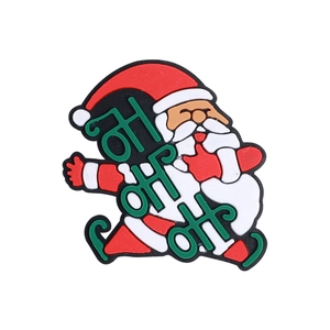 Dettaglio della perla in silicone Babbo Natale con testo HO HO HO verde e abito rosso
