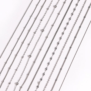 Detailed view of various stainless steel chain styles including box, snake, and bead links