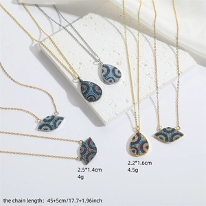 Evil eye pendant necklace in gold and silver finish with colorful micro-inlaid bead charms