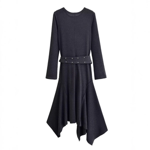 Elegant black long sleeve asymmetric dress with a ruffled hem and metal eyelet belt