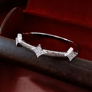Silver 18K plated star motif bangle with pleated texture and sparkling pavé crystals