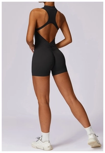 Detailed back view of black compression yoga bodysuit with racerback and ruched butt lifting