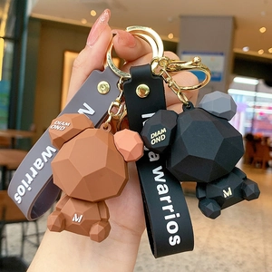 Creative geometric bear keychain set in brown and black with durable silicone wrist strap