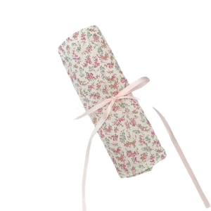Portable floral fabric makeup brush roll organizer with elegant pink ribbon bow closure