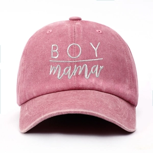 Detailed front view of pink washed cotton baseball cap with BOY mama embroidery
