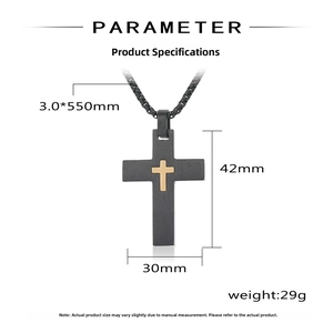 Detail of black matte double cross necklace with golden cross inlay and size parameters