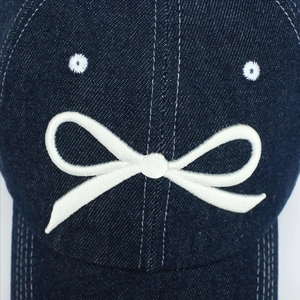 Denim baseball cap with white embroidered bow and stars in navy blue finish