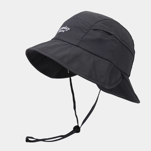 Detail of black quick-dry sun hat featuring neck flap protection and side embroidery