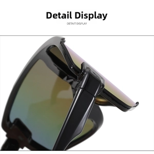 Detailed close-up of rainbow gradient lenses and black polished frame on cycling sunglasses