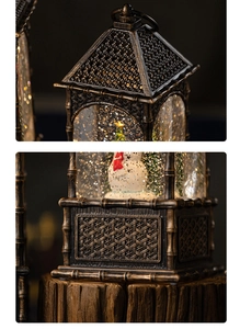 Detail of vintage bronze Christmas lantern featuring a snowman scene and ornate metal texture