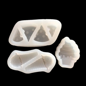 Silicone molds for cheese ice cream cones and cupcakes on a sleek black background