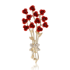 Elegant red rose brooch with golden bow and crystal accents for women fashion