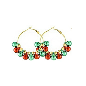 Close-up of festive Christmas hoop earrings with red, green, and gold metallic balls