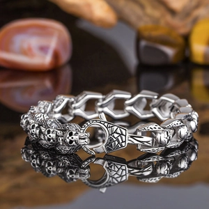 Gothic skull bracelet in silver stainless steel featuring heavy punk style chain links