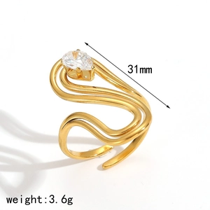 Detailed view of gold wave ring with pear-shaped zircon showing 31mm size and 3.6g weight