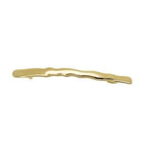 Minimalist irregular wavy gold alloy hair clip with polished metallic finish on white background