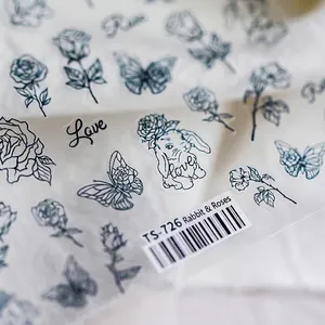 Stickers nail art japonais avec lapins, roses et papillons en noir et blanc élégants