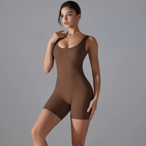Detail of the high-stretch fabric and seamless V-back design of the brown yoga bodysuit