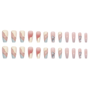 Long coffin fake nails set featuring blue gradient, glitter, and rhinestone accents