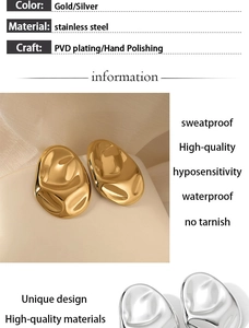 Close-up of irregular wave-shaped stainless steel earrings in gold and silver finish