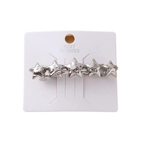 Silver spring hair clip featuring five stars on white card for elegant hair styling
