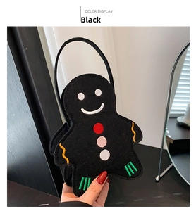 Détail du sac à main en feutre bonhomme de pain d'épices avec broderie colorée