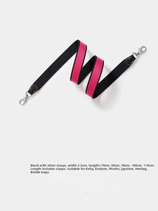Detail of 2.5cm wide woven shoulder strap with adjustable 70-110cm length and silver buckle