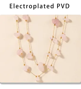 Detail of PVD electroplated gold chain with delicate natural pink quartz stones