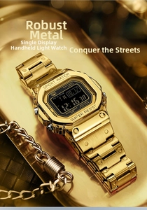Close-up of gold digital sports watch with metal band and auto-backlight feature