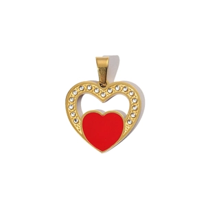 Close-up of heart-shaped gold-plated pendant with red enamel and inlaid rhinestones