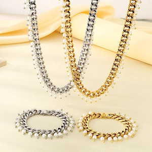 Elegant 9mm Cuban link chain jewelry set with pearls in gold and silver finishes