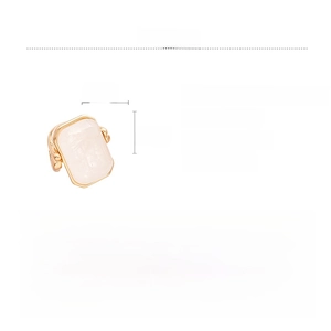 Detailed view of rectangular natural stone ring with a polished gold alloy frame