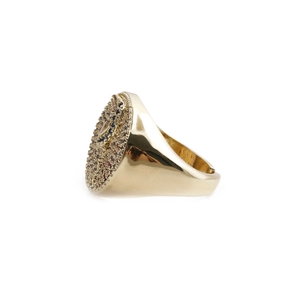 Golden hip hop ring with colorful zircon woodpecker design on a white background