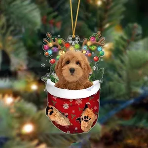 Christmas stocking dog ornament with poodle puppy and reindeer antlers for tree decoration