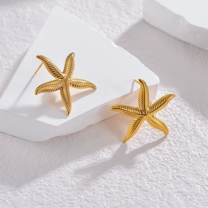 Retro 18k gold plated stainless steel starfish stud earrings on a minimalist background