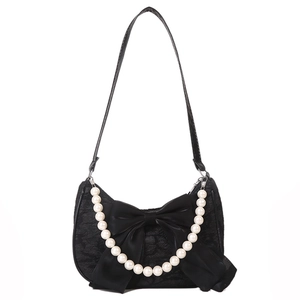 Chic black lace crossbody bag with satin bow decoration and elegant large pearl handle