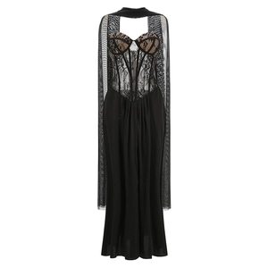 Detail of black lace corset dress featuring sheer mesh shawl and boning structure