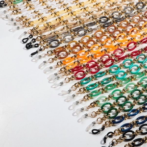 Flat lay of colorful bohemian acrylic link eyeglass chains in various vibrant color options