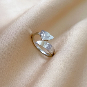 Adjustable silver titanium steel fox ring featuring a Love engraving on a silk background