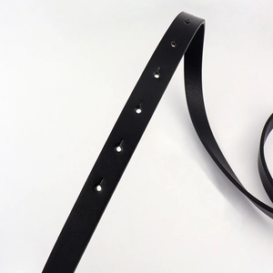 Close-up of black PU leather belt strap showing precise pre-punched holes and texture