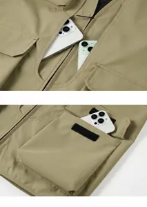 Detail of outdoor utility vest showing large cargo pockets and velcro closures
