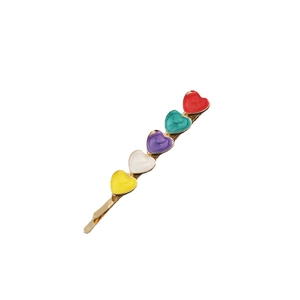 Golden heart hair clip with colorful enamel heart charms in yellow, white, purple, green, red