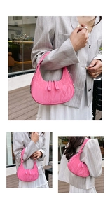 Detailed views of a pink hobo bag featuring dual zippers and textured glossy leather